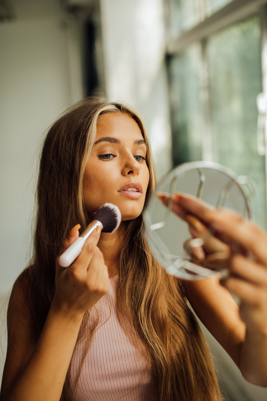 Woman Putting on Make Up